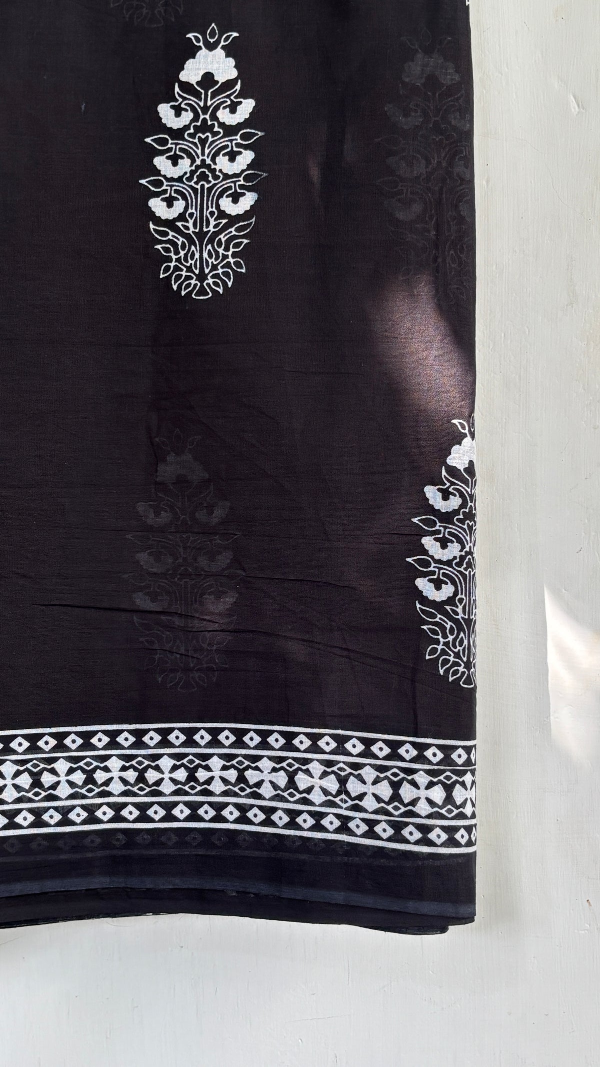 Black and White Floral Printed Mul Cotton Saree with Geometric Border