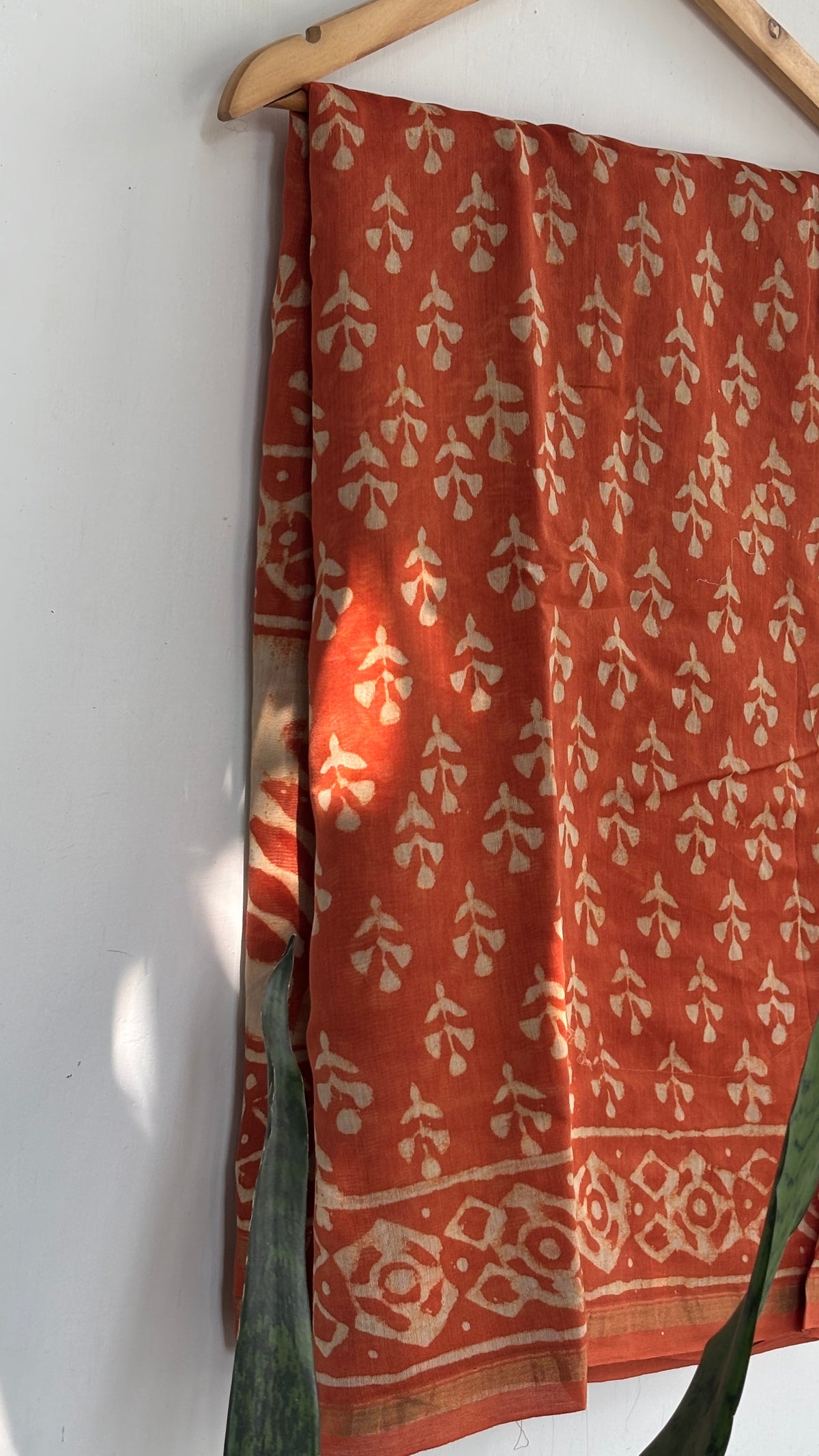 Handblock Printed Orange Chanderi Silk Saree with Big Leaf Border