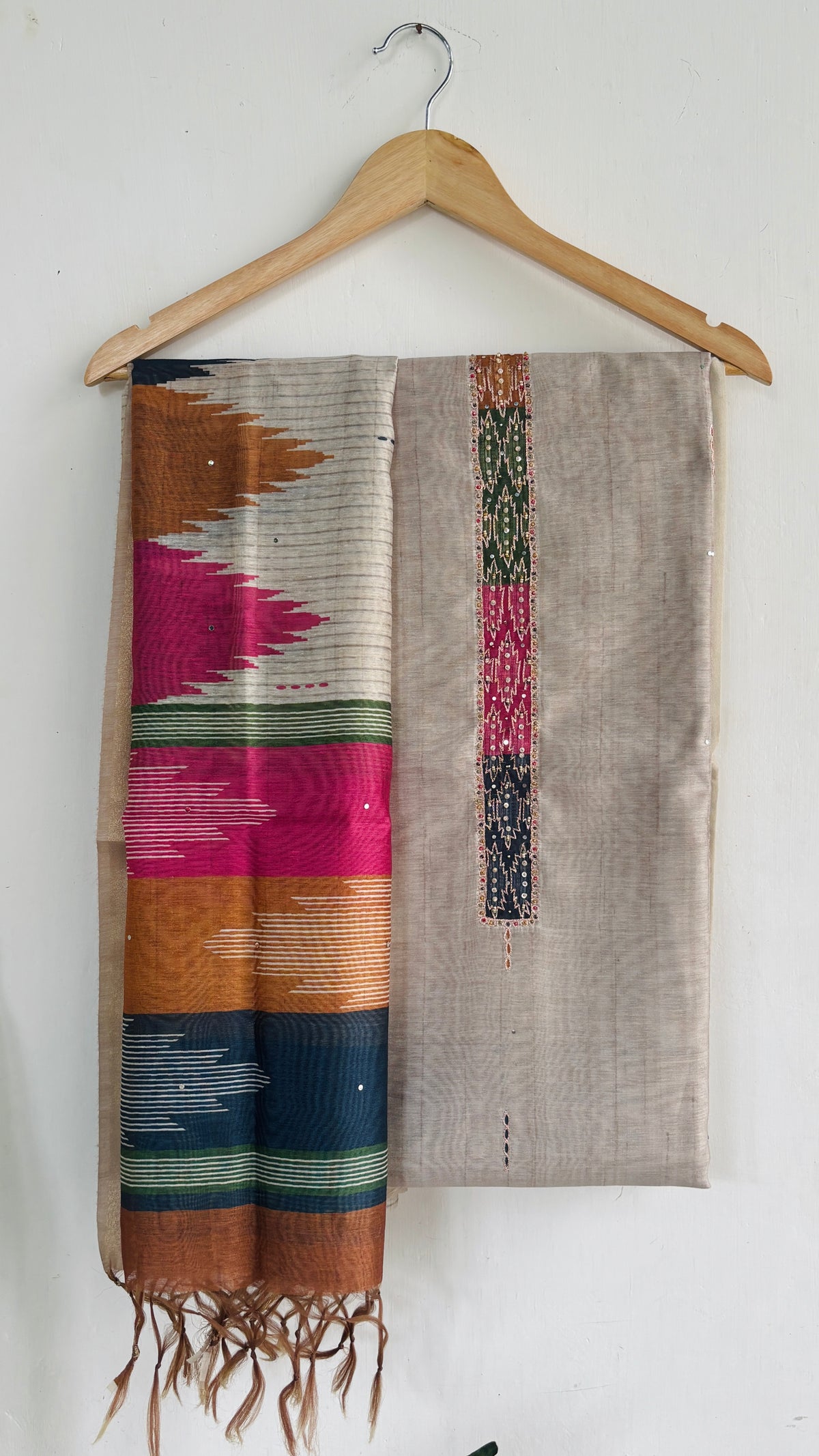 Woven Suit Set with Multicolored Geometric Dupatta and Tassel Detailing