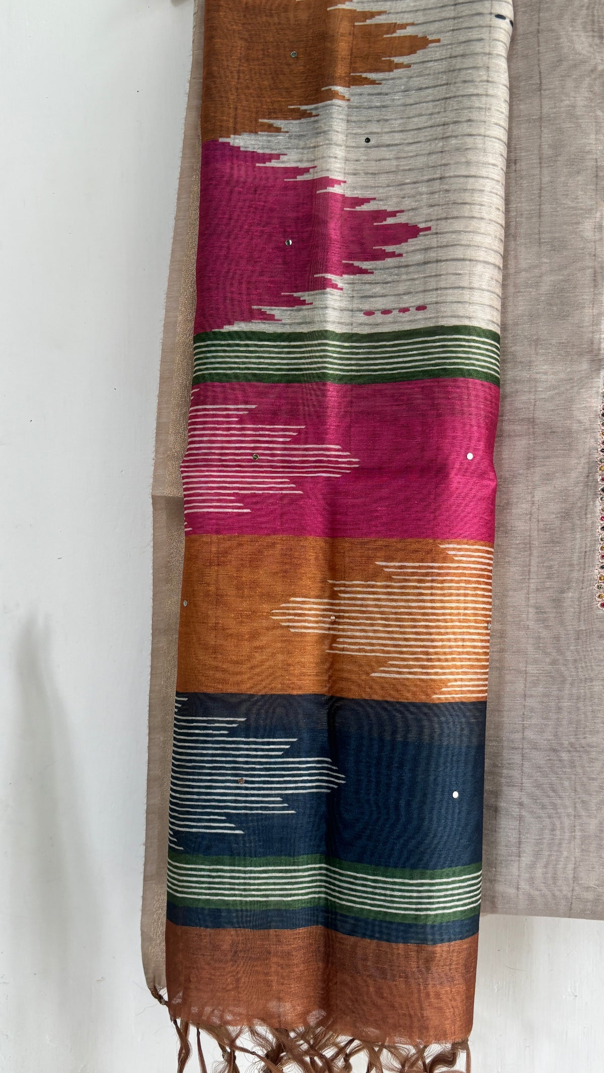 Woven Suit Set with Multicolored Geometric Dupatta and Tassel Detailing